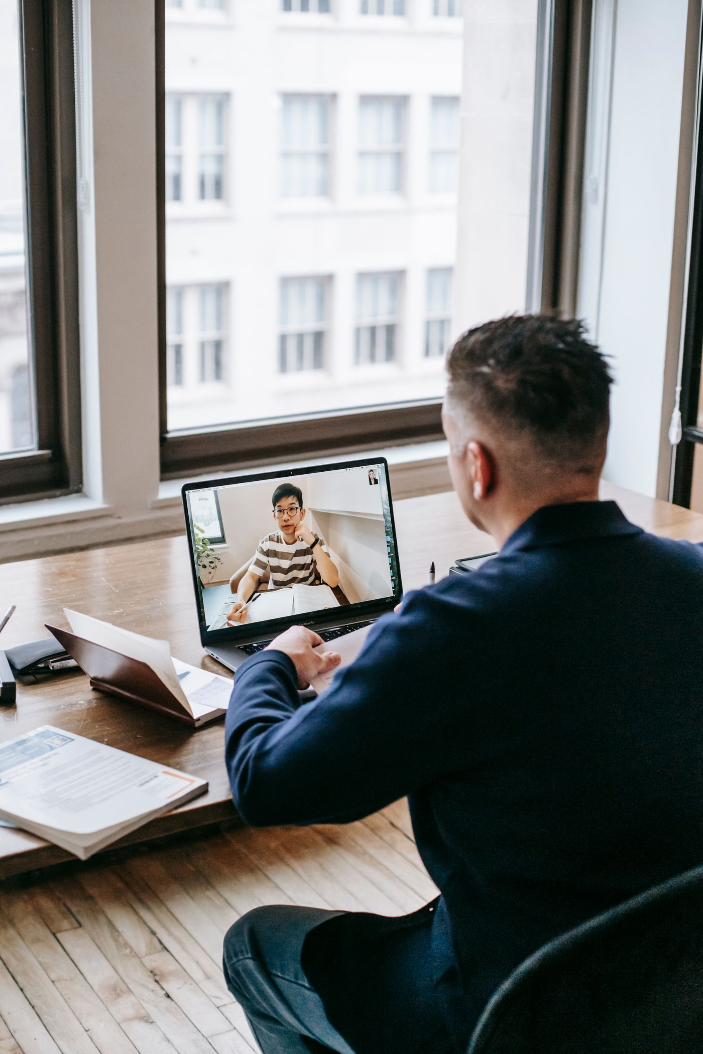 A founder on a video call with his Right Hand